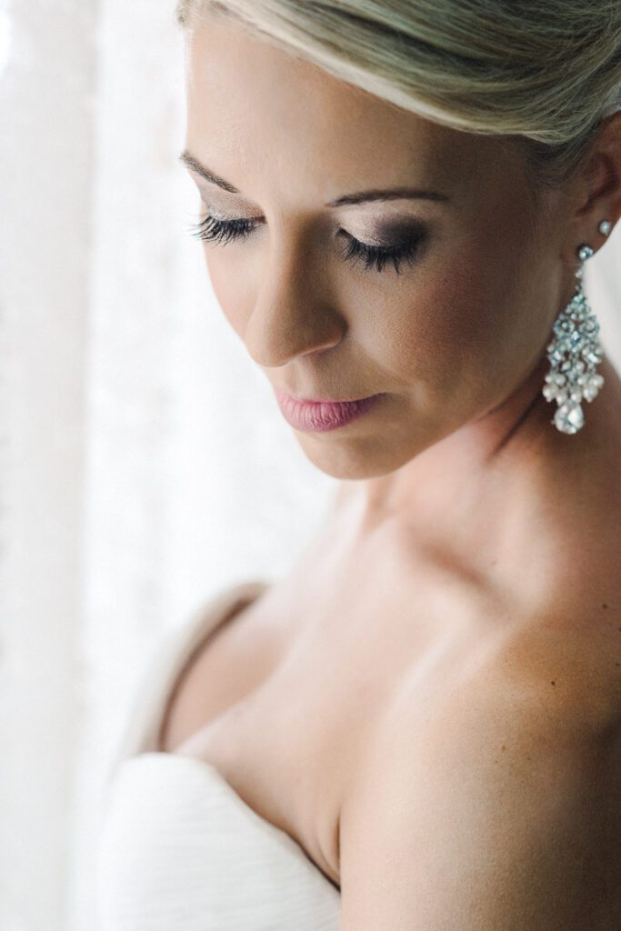 blonde bride portrait with large ear rings