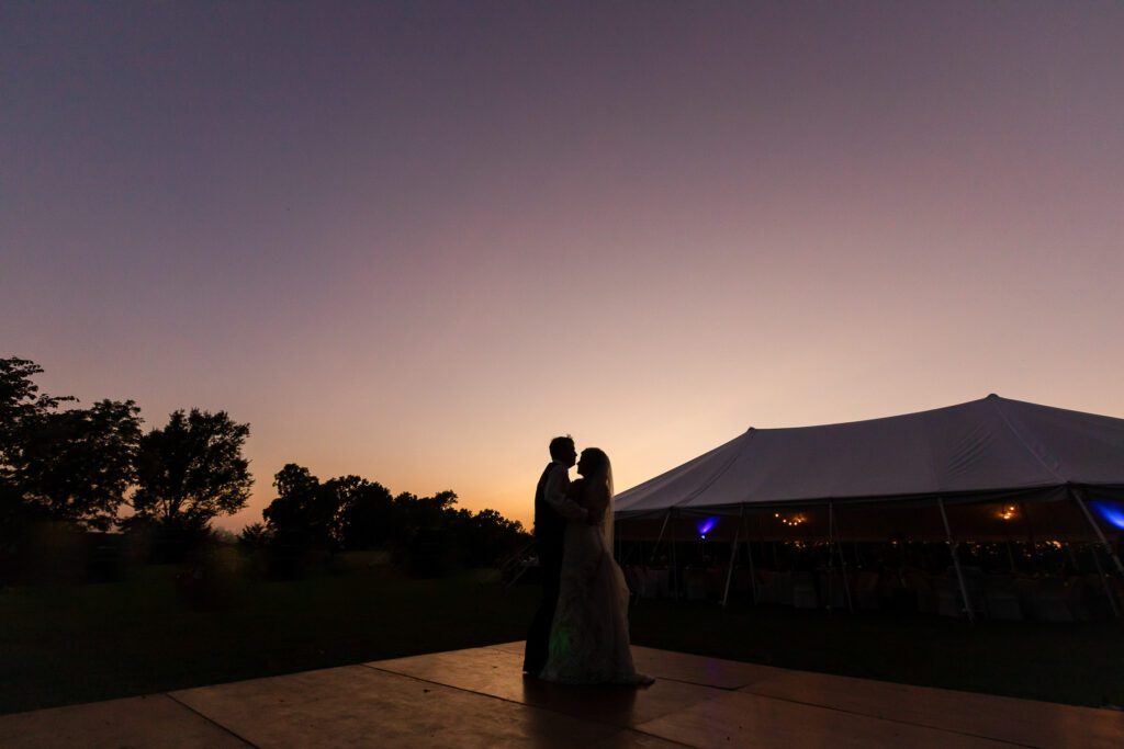 bride and groom dancing at sunset at Chatol House and Gardens Centralia, MO