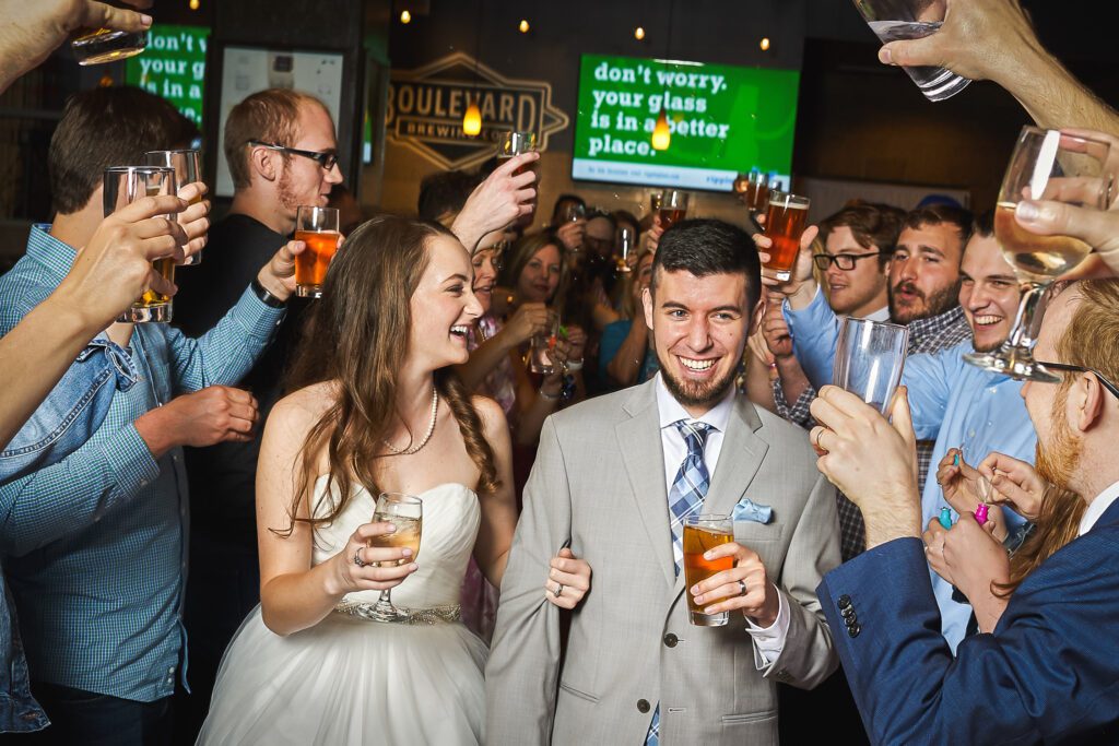 bride and groom celebrating with family at boulevard brewery