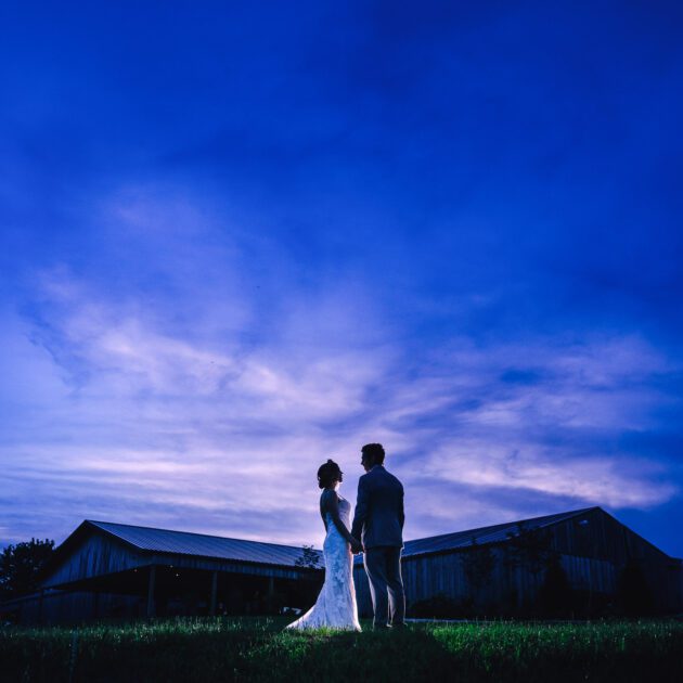 Bride and Groom against night sky wedding at Coopers Ridge