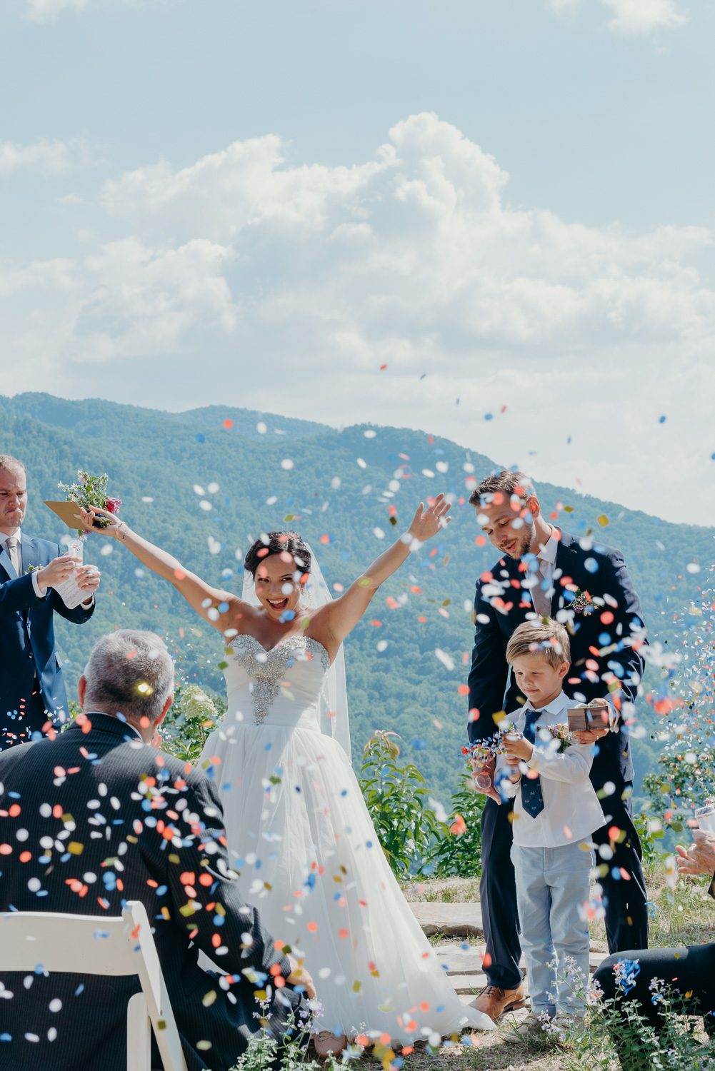 confetti in front of bride franklin north carolina mountain top destination wedding