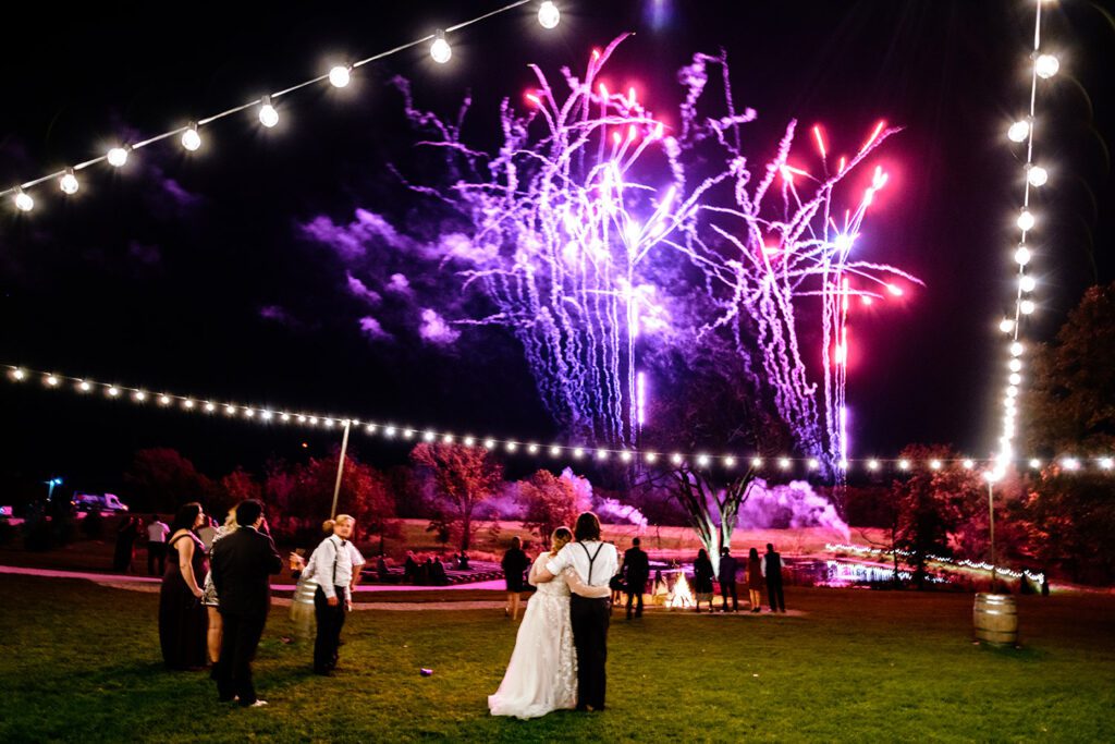 Bride and Groom watch fireworks at Coopers Ridge Wedding