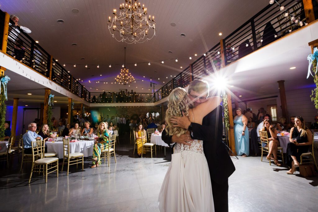 father hugging bride at Emerson Fields, Excello, MO