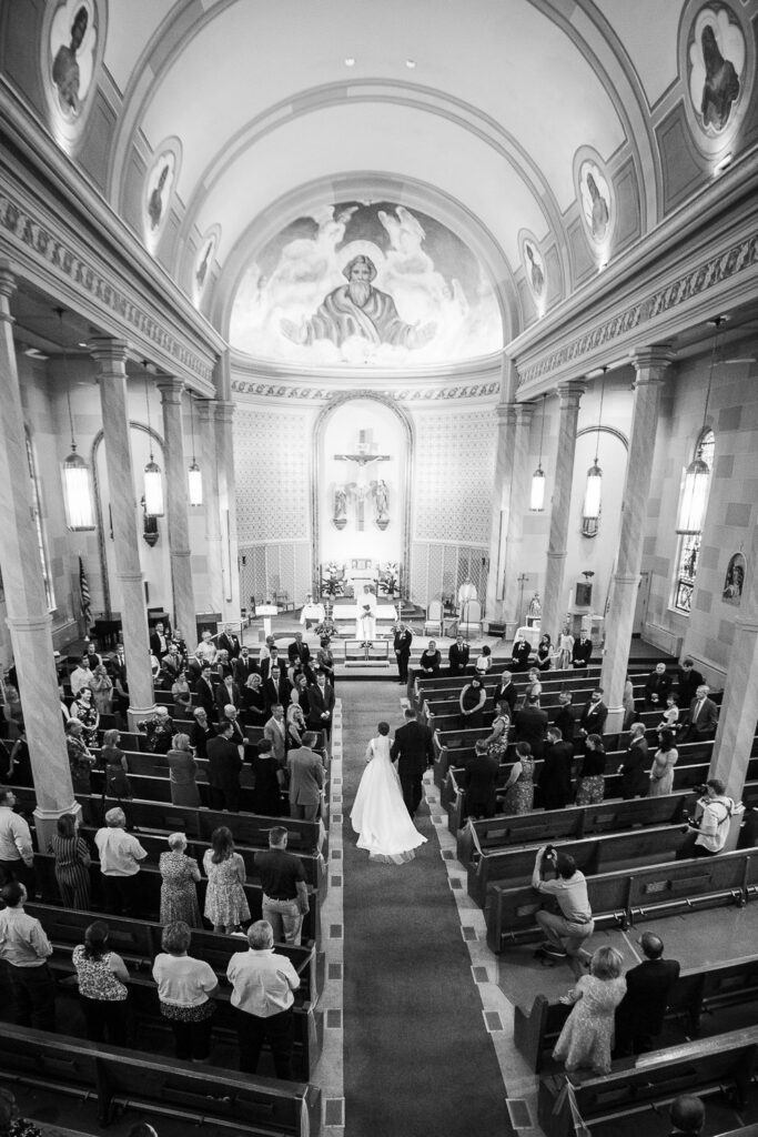 father walking bride down aisle at catholic church Washington, MO
