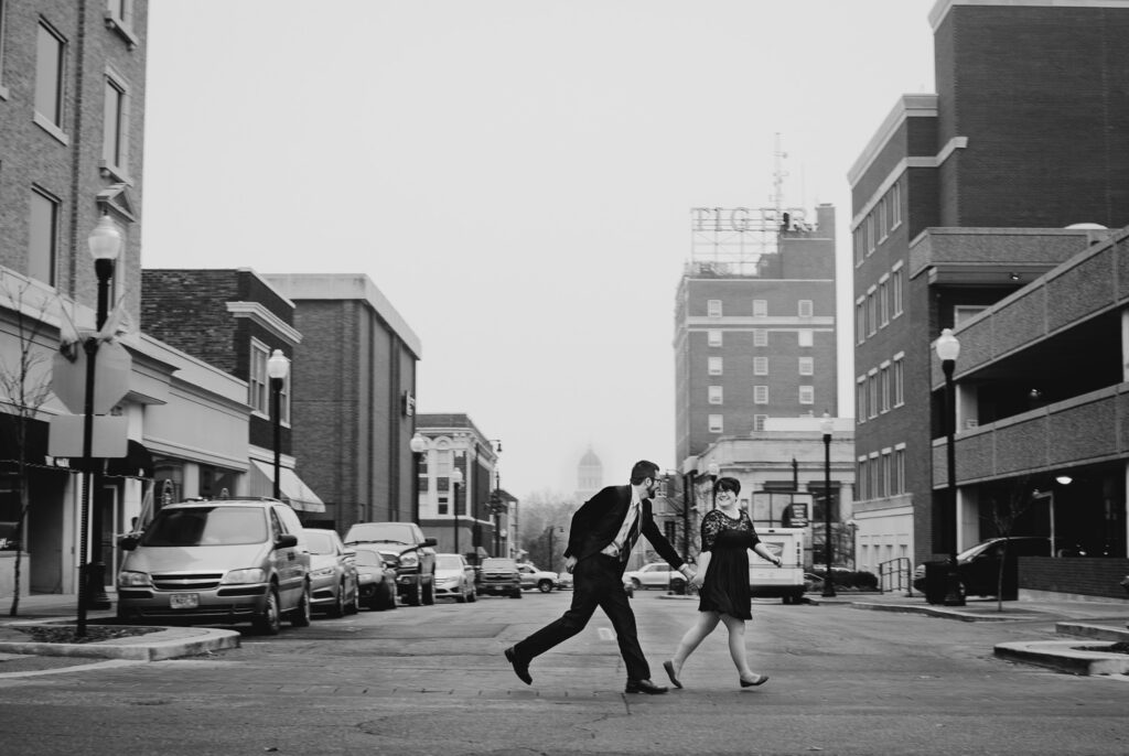 newlyweds run through streets in downtown columbia missouri
