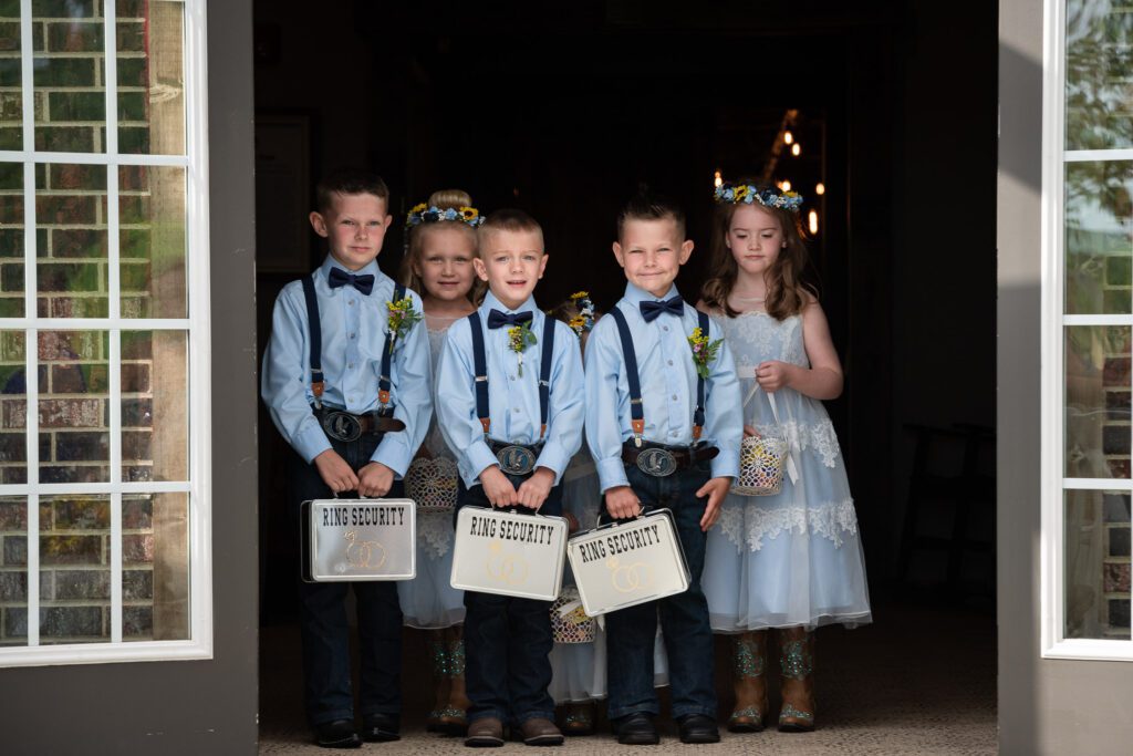 ring bearers and flower girls waiting holding ring security The Barn III Goodfield, IL