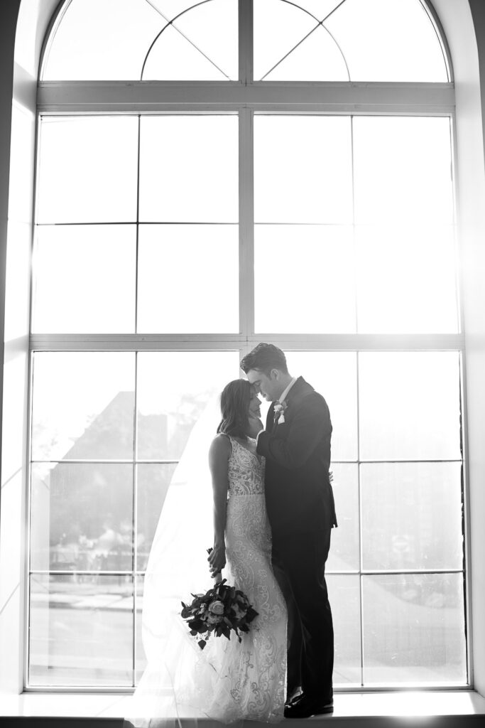 romantic couple in giant window