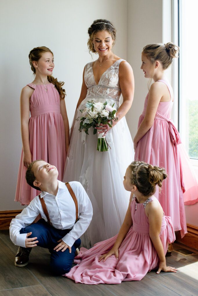 Bride surrounded by children