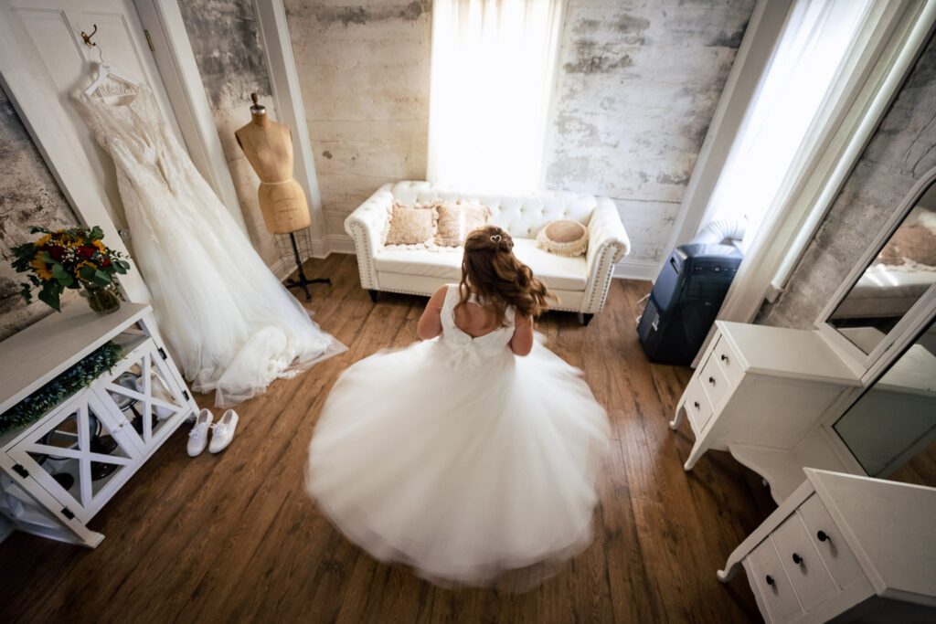 flower girl twirling in poofy dress
