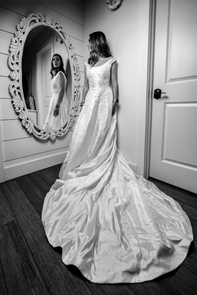 bride reflection in mirror in dressing room