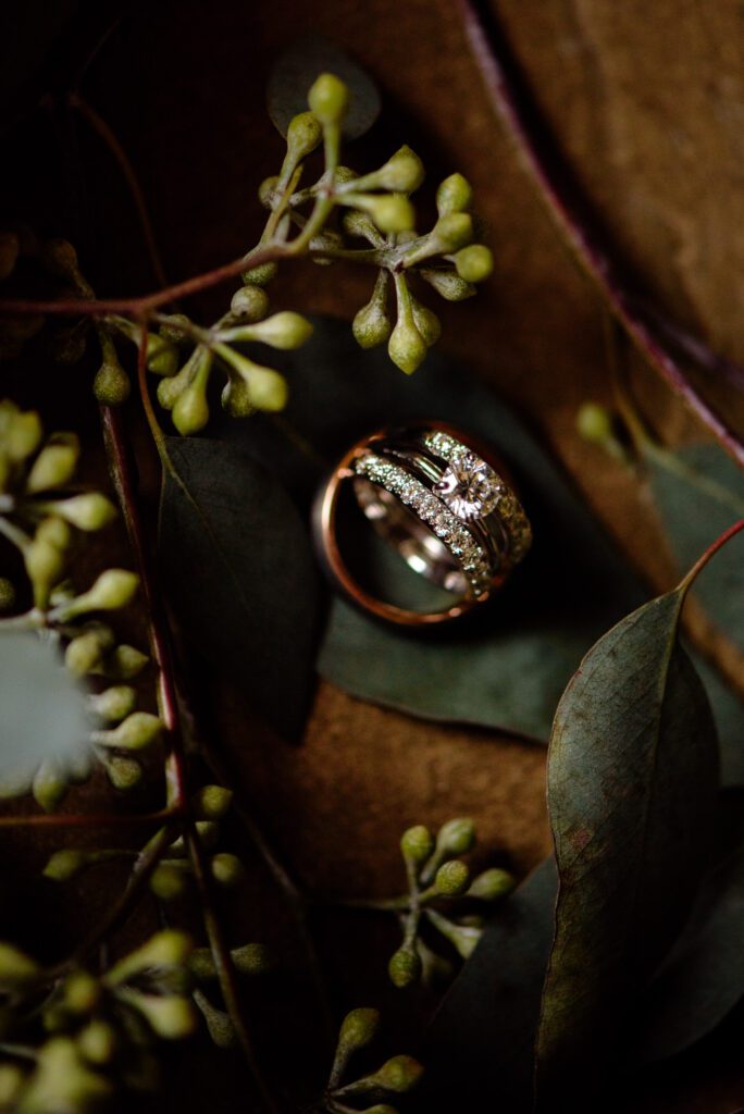 ring in greenery on wood