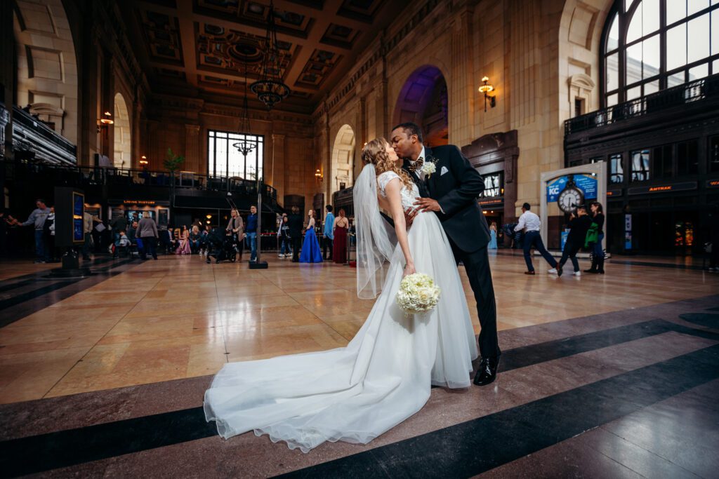 biracial couple wedding kiss kansas city union station