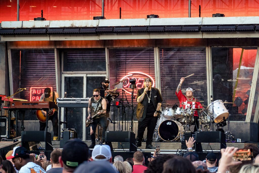 jelly roll on stage with band at Busch Stadium in St. Louis Missouri