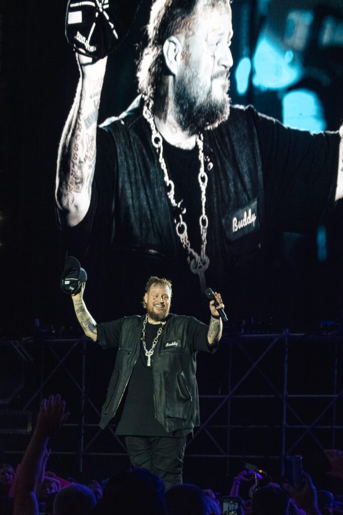 jelly roll waves to crowd with hat in hand at Busch Stadium in St. Louis Missouri