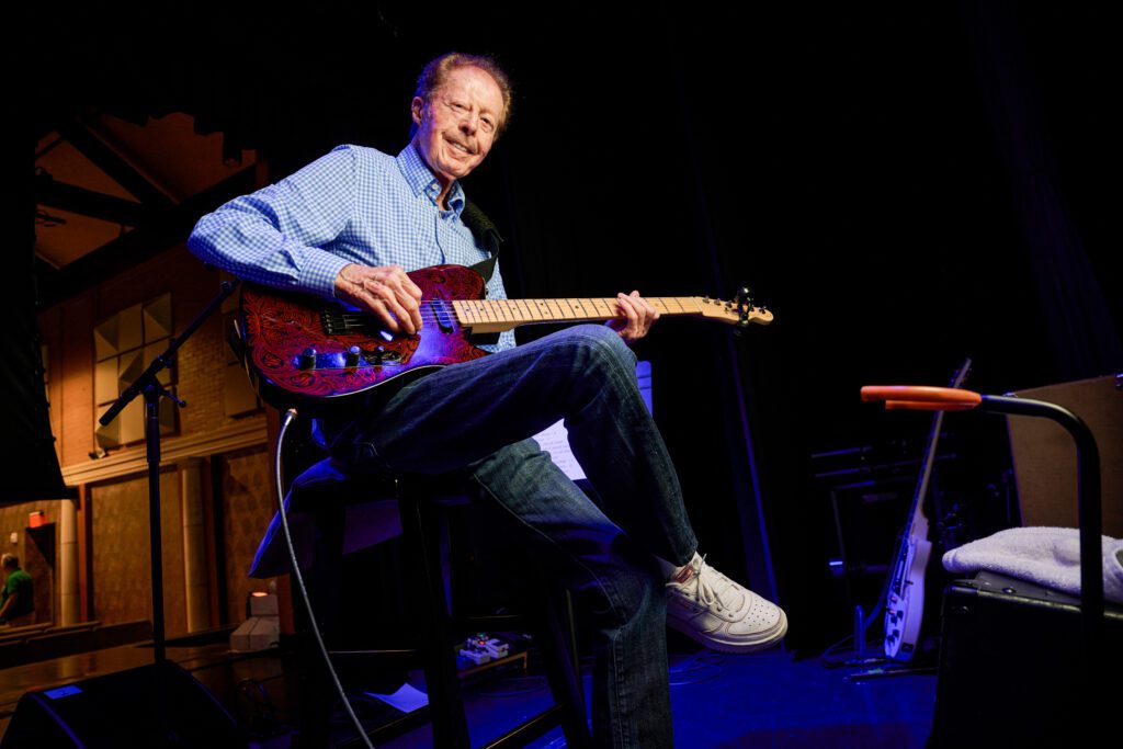 Kenny Lovelace poses with his guitar which was gifted to him by Elvis' guitar player James Burton