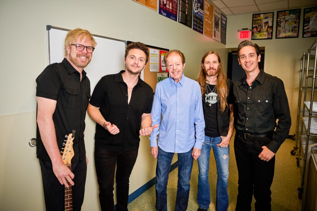 singer and piano player jacob tolliver poses with kenny lovelace and bandmates at Williams County Performing Arts Center in Franklin, TN