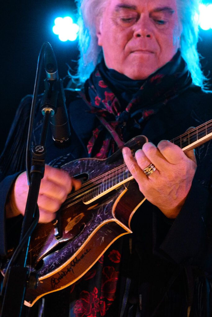 Marty Stuart playing mandolin