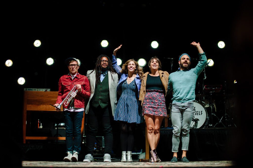 Lake Street Dive band members wave to crowd.