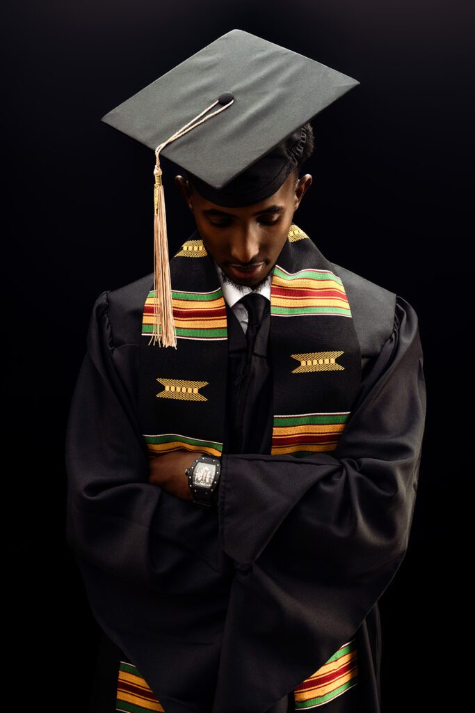 College Black Senior Guy Kente Stoll and Mortar Board