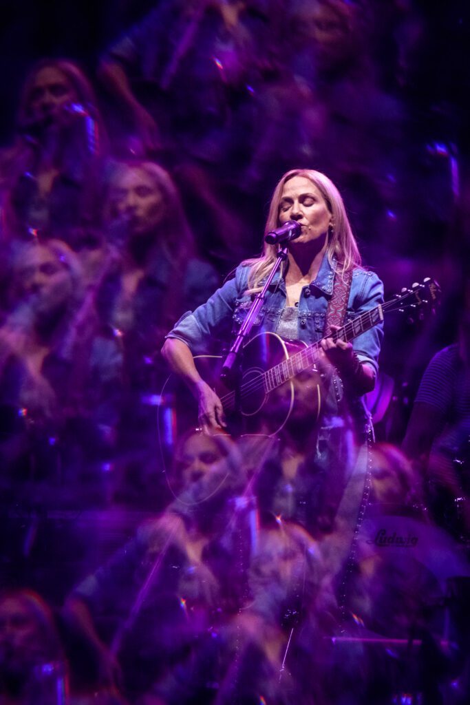 Sheryl Crow in multiple exposure image shot through prism