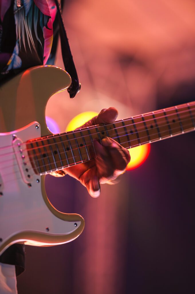 closeup shot of buddy guy playing guitar