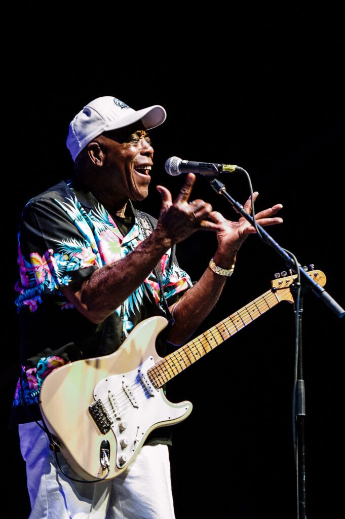 Buddy Guy motions as he sings