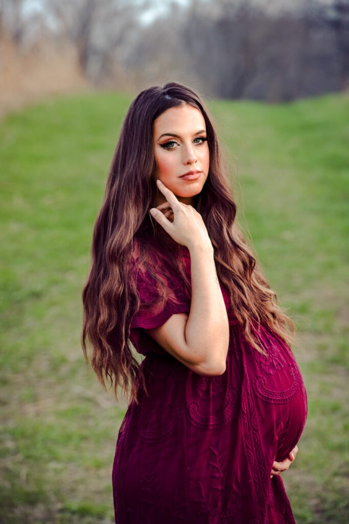 pregnant woman wearing burgundy dress