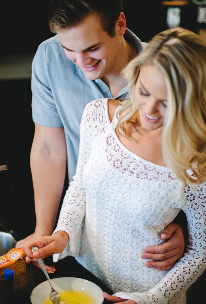 couple cooking in kitchen