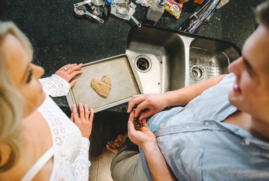 couple looking at each other heart shaped cookie