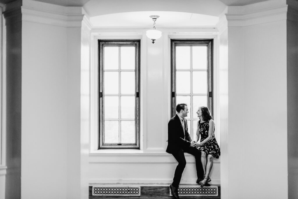 couple sitting in window Missouri State Capital