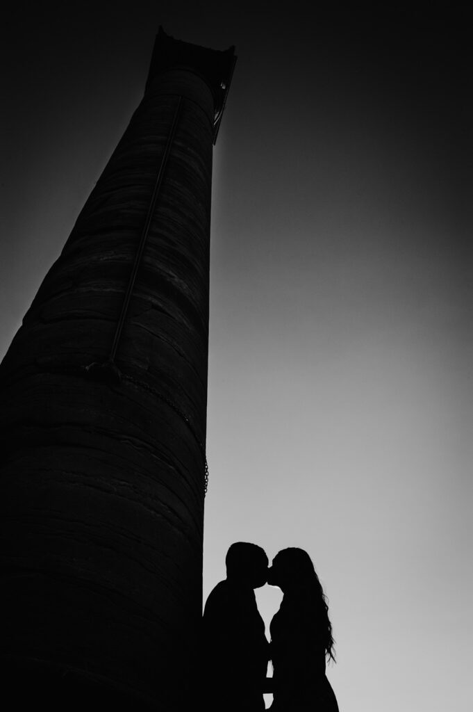 silhouette of couple in front of Mizzou columns