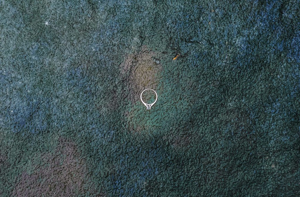 engagement ring on frozen water