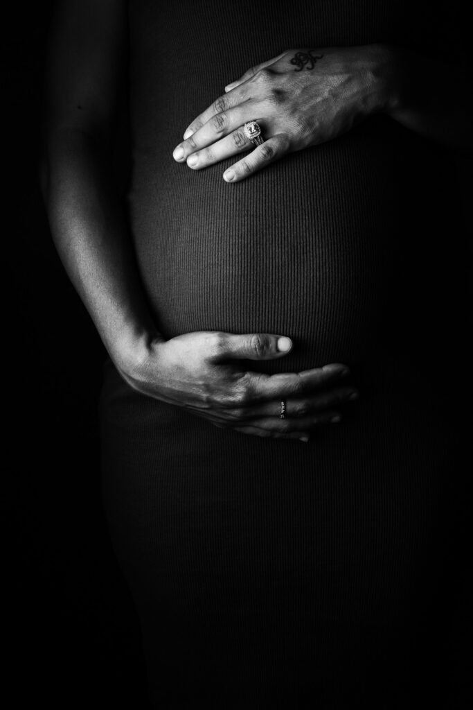 hands on pregnant belly