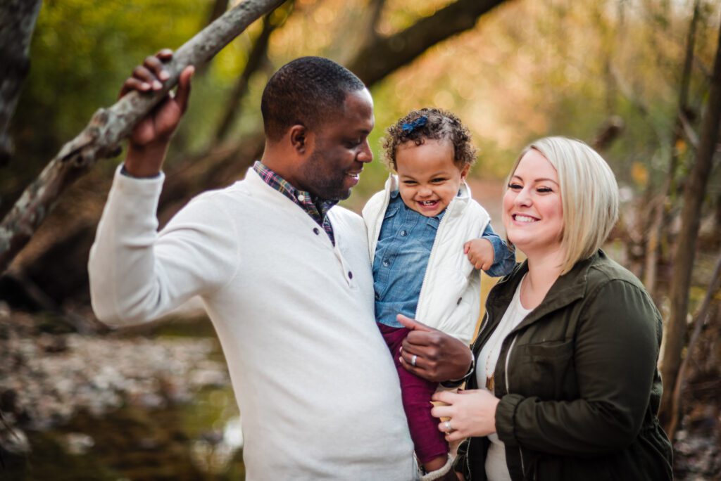 Smiling family at Capen Park in Columbia Missouri