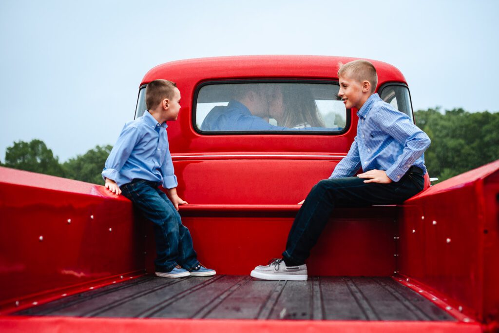 Old red truck family photo