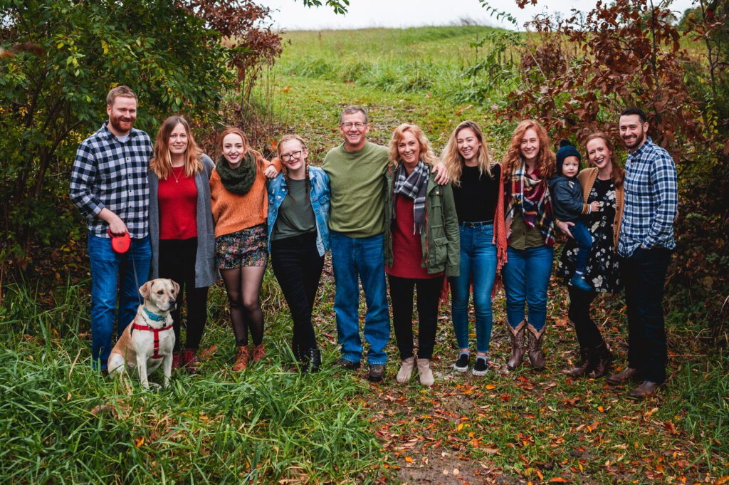 large family group photo on farm
