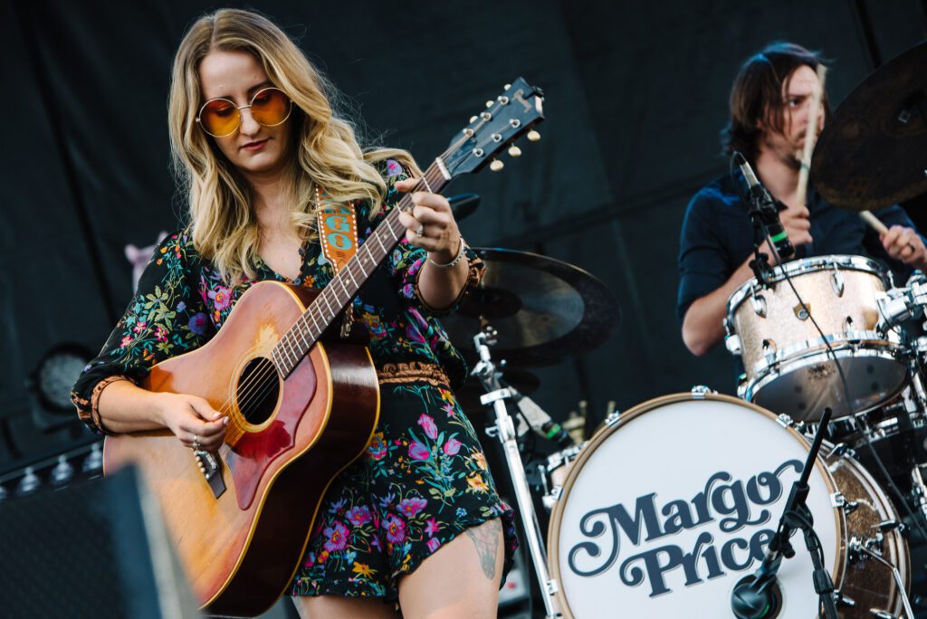 margo price plays in front of her band in columbia missouri