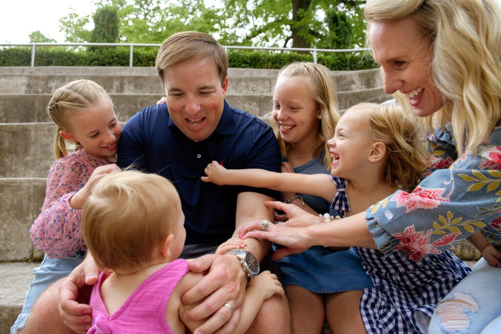 family tries to tickle dad