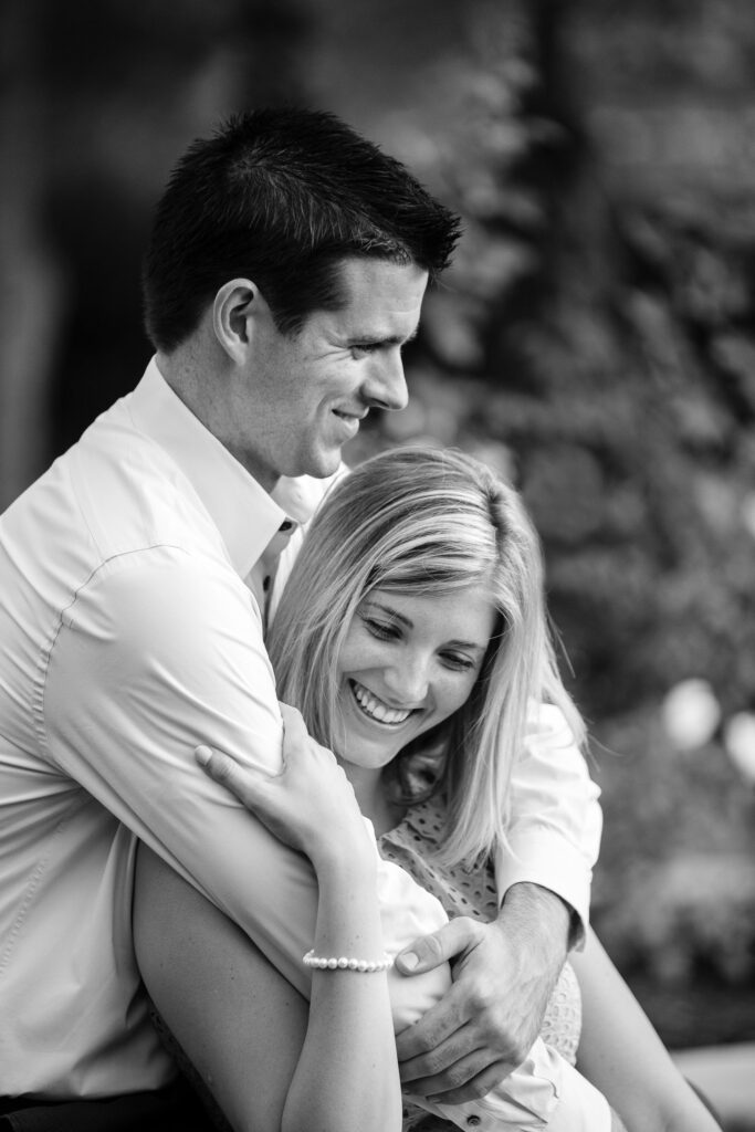 guy hugs girl as they laugh