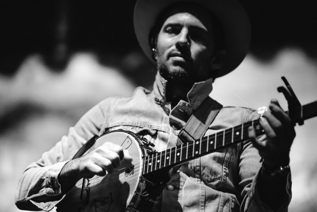 Scott Avett playing banjo in columbia missouri