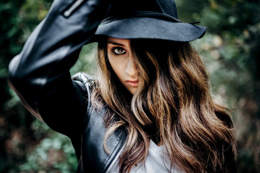senior girl wearing black hat