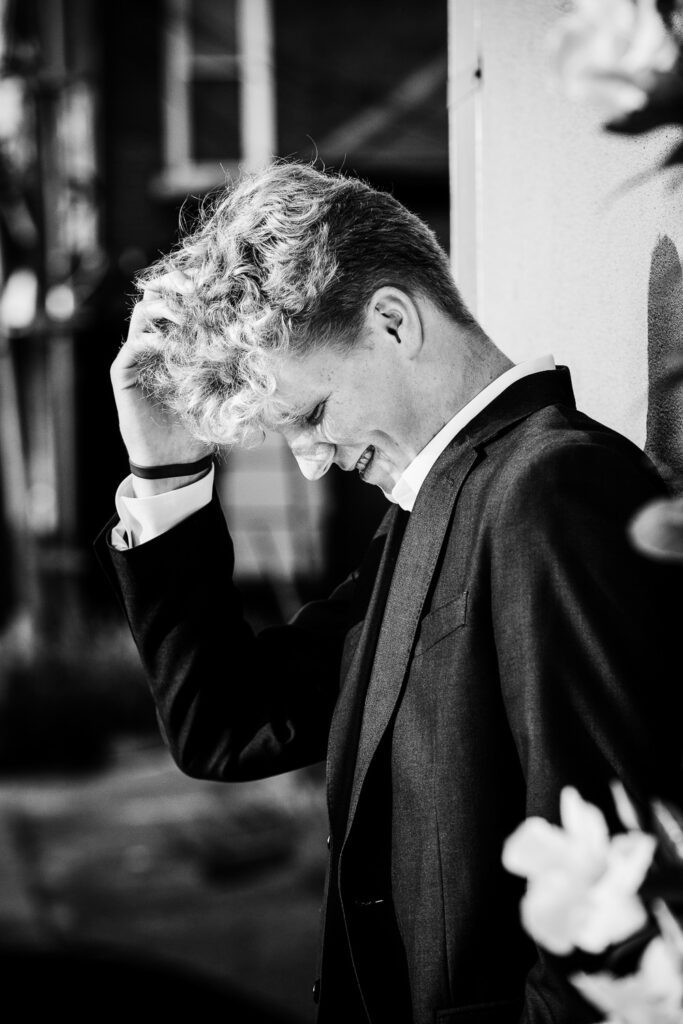 senior guy blonde hair in suit