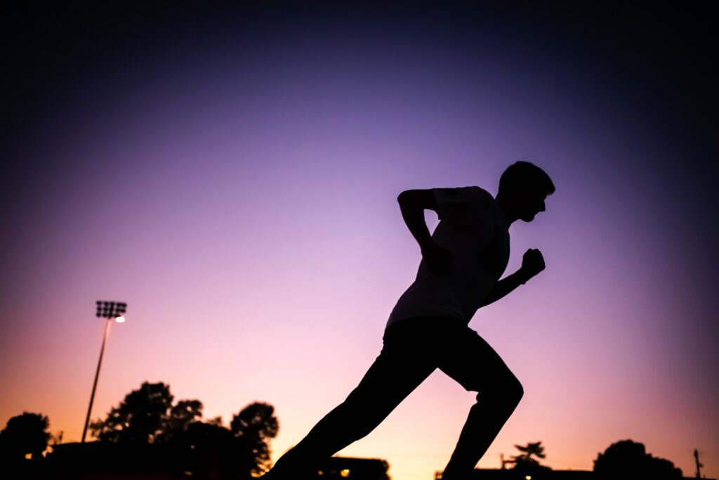 senior guy running track silhouette