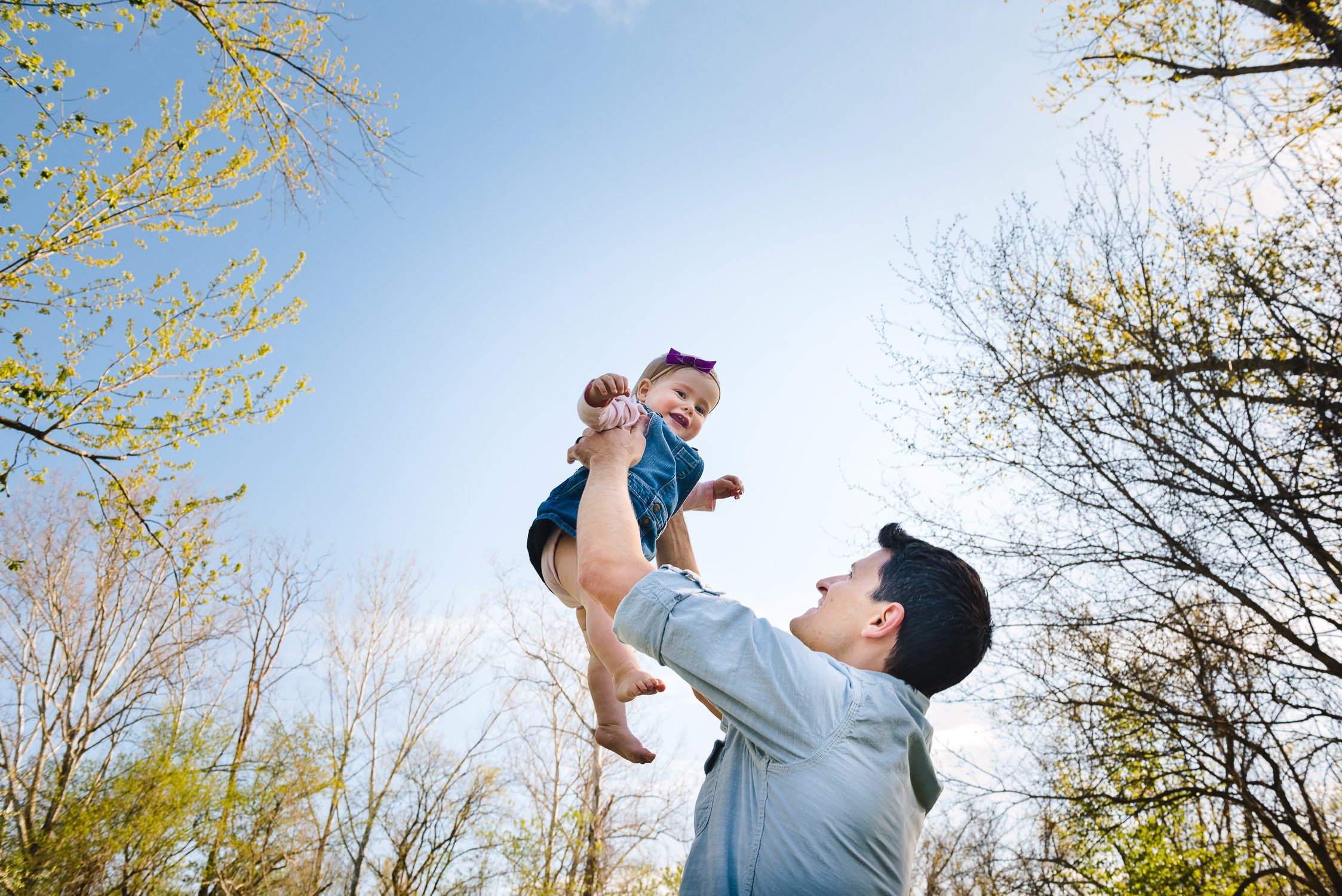 Daddy holding daughter for Kasmann Family Photos by Schaefer Photography in Capen Park, Columbia, Missouri.