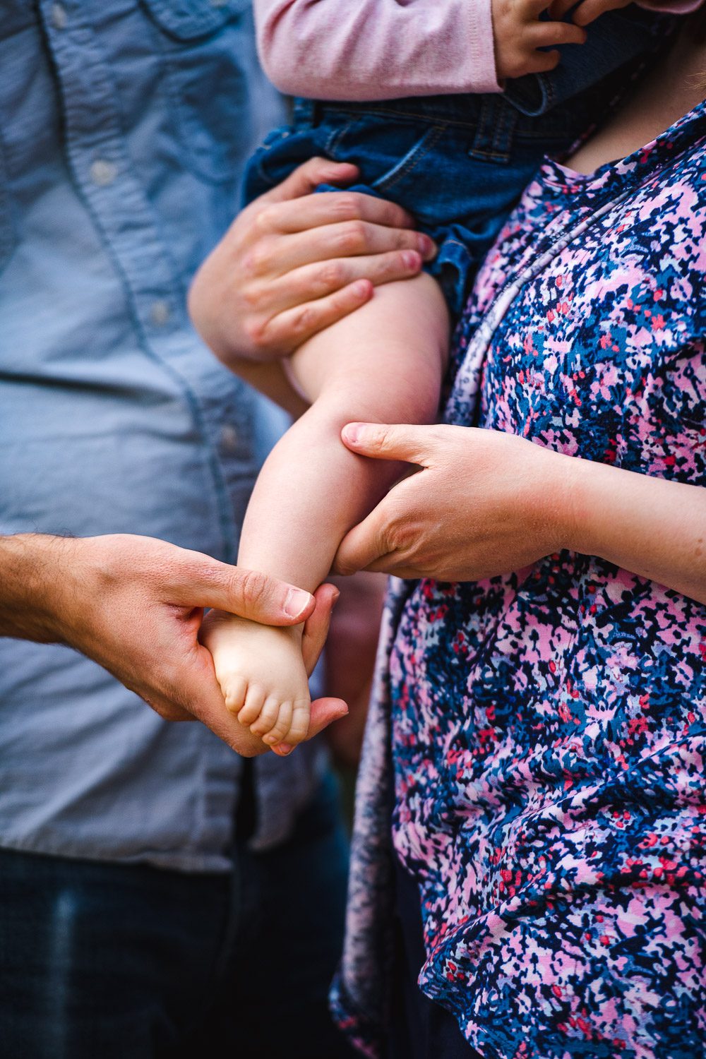 Close up of daughters tiny feet - Kasmann Family Photos by Schaefer Photography in Capen Park, Columbia, Missouri.