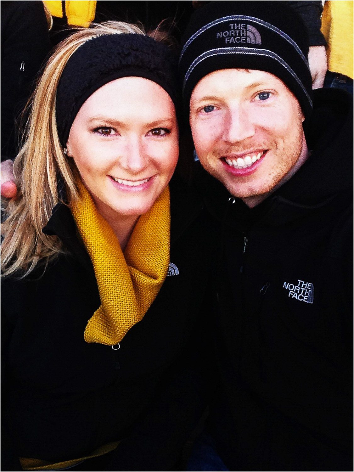 couple wearing black and gold mizzou apparel