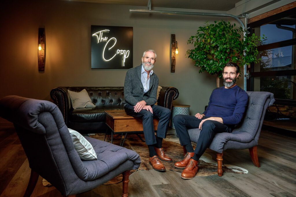 two guys sit in the coop at Coopers Ridge Event Center near Columbia Mo.