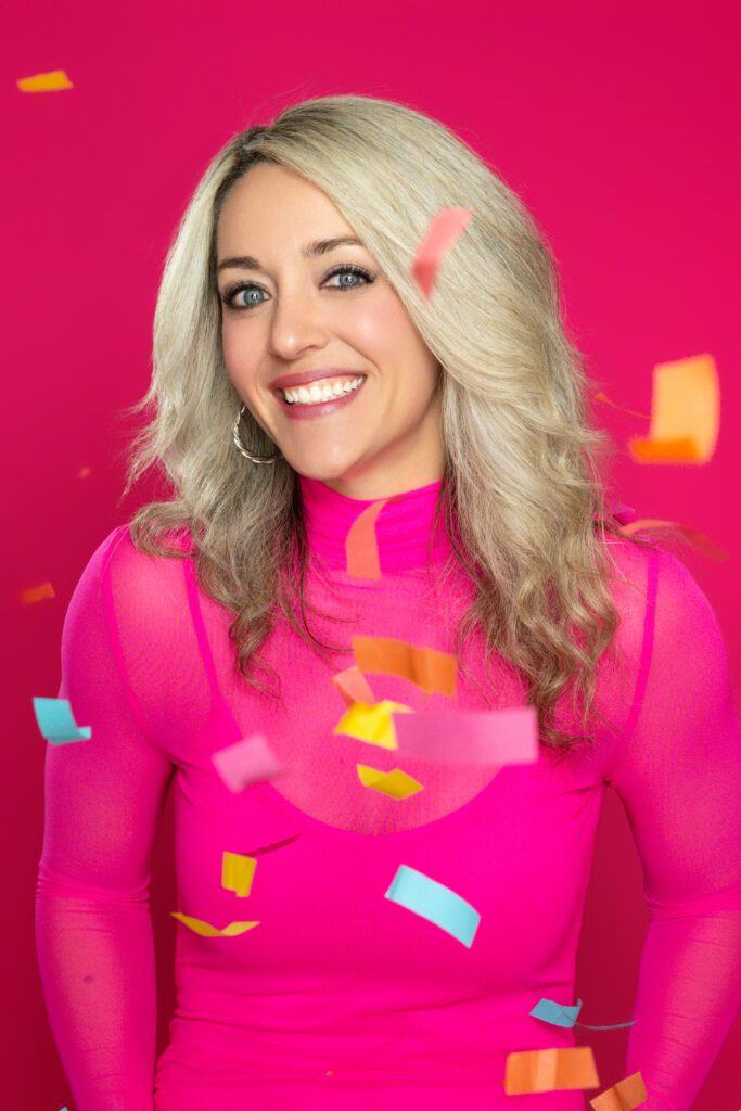 professional portrait with confetti pink color blonde woman