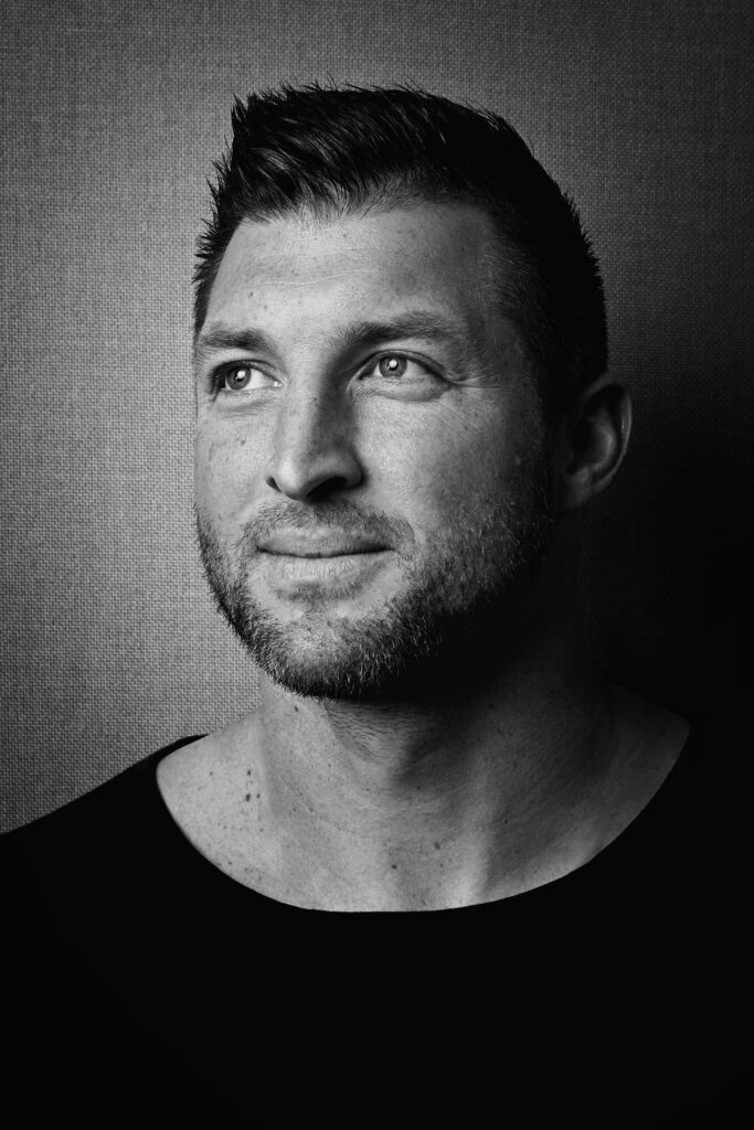 Tim Tebow portrait on burlap backdrop
