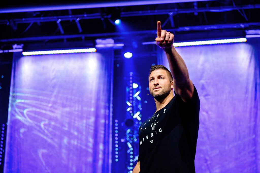 Tim Tebow points during speech in Columbia, Missouri.